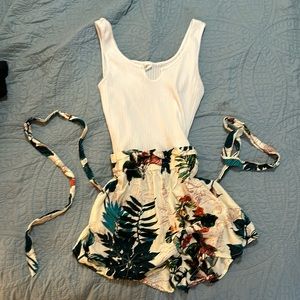 Little white/floral romper size M but pretty small (can fit both - stretchy)